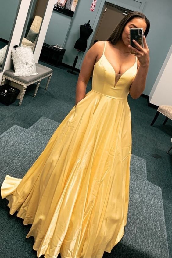 Yellow A-line long prom dress features with spaghetti straps and pockets cg16487